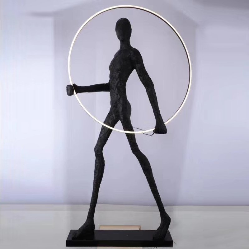  Man carries light circle   -- | Loft Concept 