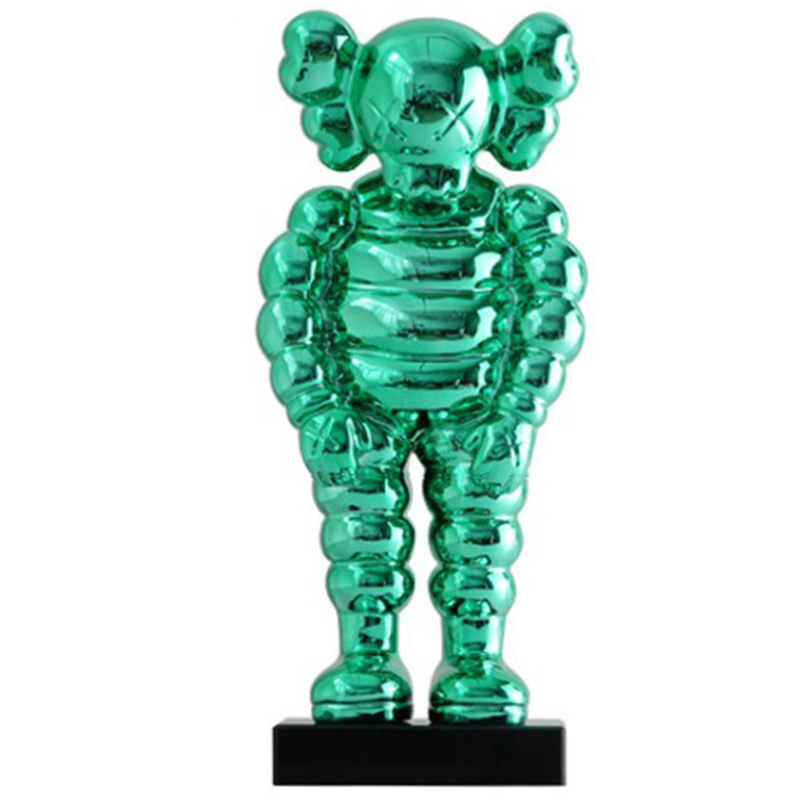  KAWS Bowed Down Green on stand   -- | Loft Concept 