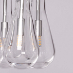 Люстра с 7-ю прозрачными плафонами из стекла в форме капли на круглом потолочном основании цвета хром Lucid Rain  варинант исполнения - 8 | Loft Concept в Ростове-на-Дону