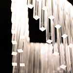 Люстра золотого цвета в форме галочки с каскадом длинных прозрачных трубок Eurofase варинант исполнения - 11 | Loft Concept в Ростове-на-Дону